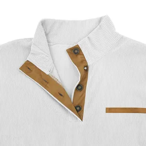 Close-up of white corduroy men's jacket with brown stand collar and snap buttons