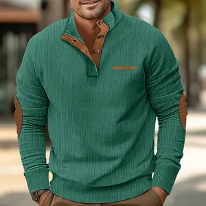 Detail of men's teal sweatshirt with brown corduroy patches and button stand collar