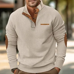 Detailed view of men's corduroy sweatshirt featuring a stand collar and elbow patches