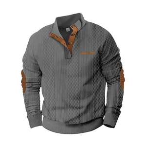 Vista detallada jersey jacquard gris hombre cuello alto con parches cuero en codos