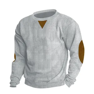 Detailed close-up of men's gray ribbed corduroy sweatshirt featuring brown elbow patches