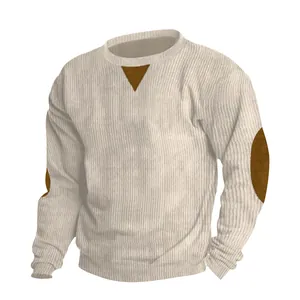 Detailed view of cream-white men's corduroy sweatshirt featuring brown elbow patches