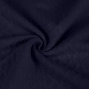 Primer plano de la textura de tela jacquard azul marino para chaqueta casual de hombre