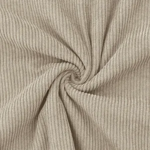 Detailed close-up showing the soft ribbed texture of light brown corduroy fabric