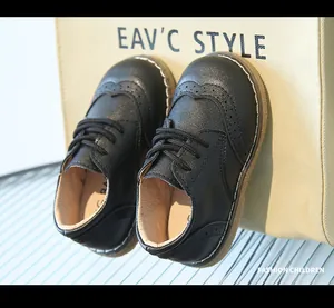Detailed view of black breathable soft leather brogue oxford shoes for boys and girls