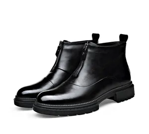 Elegantes botines de cuero negro con cremallera frontal y acabado texturizado de lujo