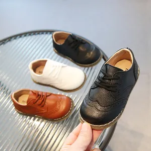 Classic breathable soft leather oxfords for kids in black, white, and brown colors