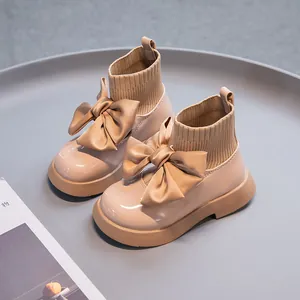Elegante beige Mädchen-Sockenstiefel mit großer Schleife und gemütlichem Strick-Stiefelettenkragen