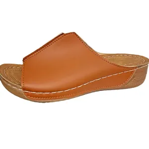 Comfortable women's wedge platform sandals in classic brown with white stitching detail.
