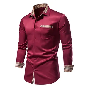 Détail d'une chemise bordeaux pour homme avec des accents à carreaux au col et aux poignets