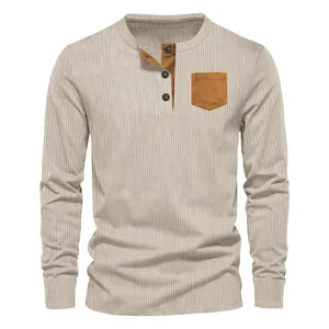 Close-up detail of men's ribbed corduroy Henley shirt featuring a contrast chest pocket