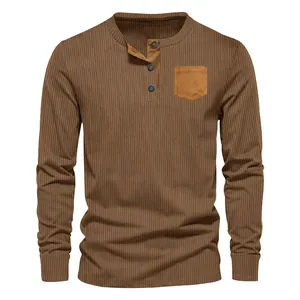 Front view of a brown men's long-sleeved corduroy Henley shirt with a contrast pocket