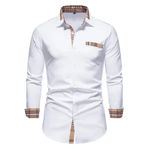 Gros plan sur le motif à carreaux du col et des poignets de cette chemise blanche pour homme