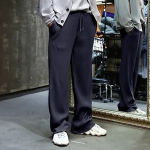 Pantalones casuales de hombre de pierna ancha con textura acanalada y cordón ajustable