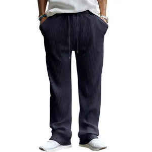 Pantalones holgados de pierna recta para hombre con textura de canalé y cordón en azul