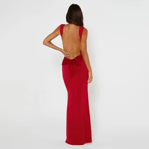 Back view of a slim-fit red maxi dress featuring a deep open back and bow detail.