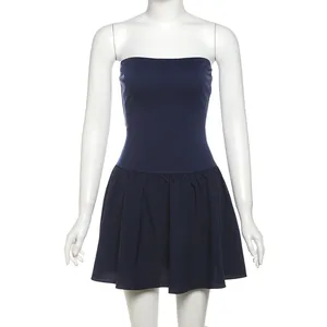 Front detail view of navy blue strapless pleated slim fit dress on white mannequin