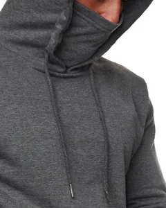 Close-up detail of dark grey hoodie with integrated high-neck mask and drawstring hood.