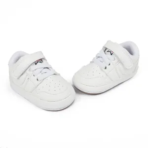 White faux leather baby walking shoes with velcro strap and breathable toe box detail