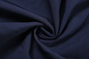 Detailed macro view showing the fine texture and navy blue fabric of the elegant dress
