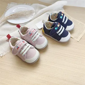 Soft sole baby walking shoes with cute cherry and vehicle embroidery for toddlers.