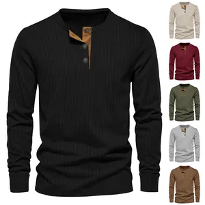 Close-up detail of men's ribbed long sleeve Henley shirt showcasing multiple color variations
