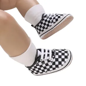 Soft sole baby walking shoes with classic black and white checkered pattern