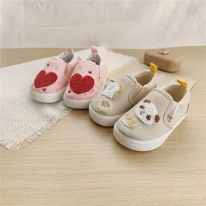 Comfortable toddler soft-sole canvas shoes featuring cute heart and panda cartoon patches