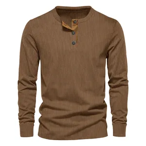 Detailed view of a brown ribbed corduroy Henley shirt for men with three-button neckline