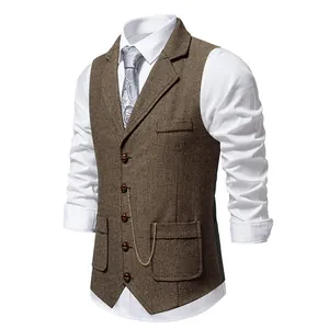 Detail view of men's brown herringbone tweed vest with vintage lapel and pocket chain