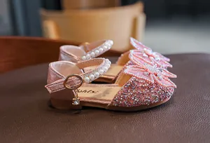Sparkling pink girls princess sandals with rhinestone butterfly and pearl straps