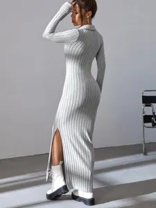 Close-up detail of a grey ribbed long sleeve maxi dress featuring a chic turn-down collar