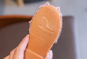 Detailed view of non-slip rubber sole for girls rhinestone princess sandals