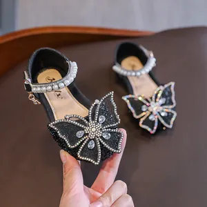 Sparkly black girls princess sandals with large rhinestone butterfly and pearls