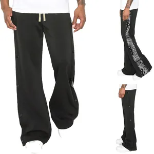 Pantalon de survêtement large pour homme avec boutons-pression et empiècement bandana.