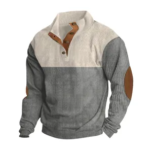 Detail view of men's two-tone corduroy pullover with button collar and elbow patches.