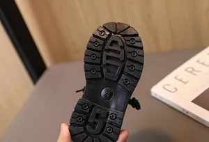 Detailed macro view of durable non-slip rubber sole for kids' leather Martin boots