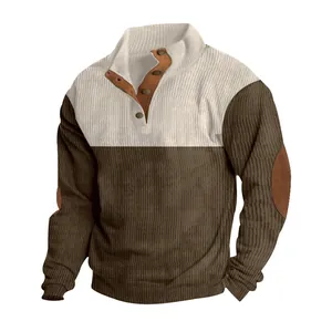 Detail of corduroy color-block sweatshirt with buttoned stand collar and elbow patches
