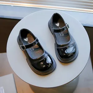 Classic black Mary Jane shoes for girls with shiny patent leather toe cap