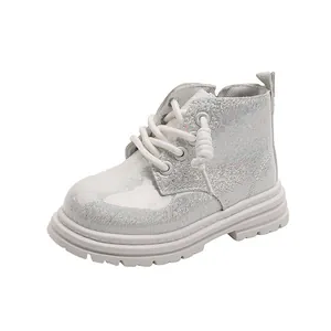 Trendy silver glitter children's Martin boots with white laces and durable rubber sole