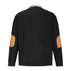 Back view of a black corduroy shirt for men featuring stylish brown elbow patches.