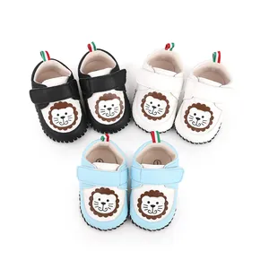 Detailed view of cute cartoon lion baby pre-walker shoes in multiple soft colors