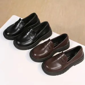 Classic British style school loafers for girls available in black and dark brown