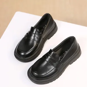 Classic black British style loafers for girls, ideal for school performances and daily wear.