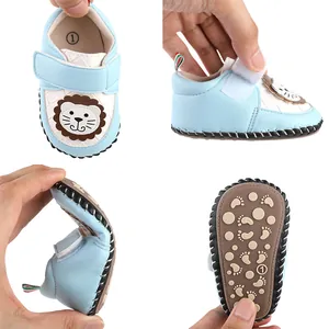 Light blue baby pre-walker shoes with lion cartoon design and flexible anti-slip sole