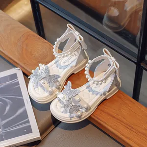 Elegant white girls sandals with pearls, rhinestones and butterfly decor for summer