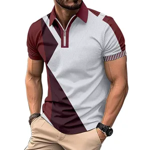 Detail of slim fit men's polo shirt with geometric color block pattern and zip collar