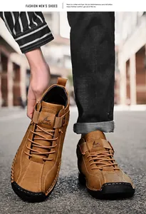 Detailed view of brown hand-stitched men's casual leather shoes with Salkin logo