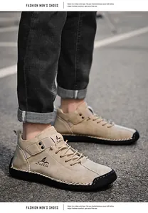 Close-up of men's khaki hand-stitched casual leather loafers on asphalt