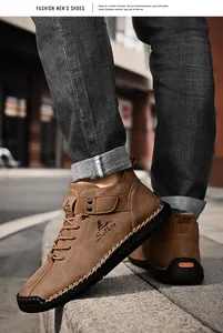 Detailed view of men's brown leather casual shoes with manual hand-stitched seams